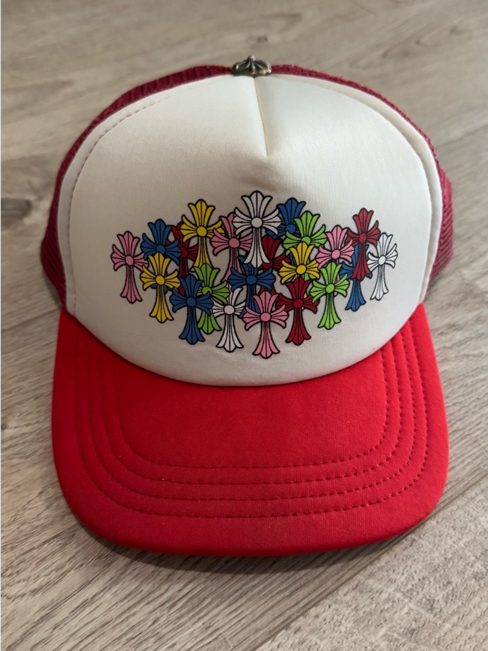 Chrome Hearts Kids Red and White Trucker Hat with Multicolor Cross Design.